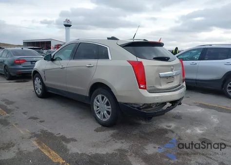 2012 Cadillac Srx Luxury Collection z USA, uszkodzony, nr VIN 3GYFNDE32CS528331